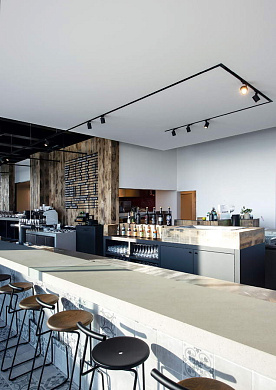 однофазный трековый светильник черный цилиндрической формы