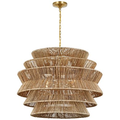 подвесная люстра с многоярусным абажуром из натурального волокна и латунной арматурой