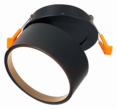 точечный светильник черного цвета с направленным светом