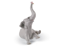 1008491 Lladro Baby Elephant фарфоровая фигурка слонёнка с цветком в хоботе