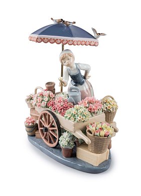 Фарфоровая скульптура цветочницы под зонтом Flowers of the Season Lladro 01001454