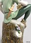 Фарфоровая статуэтка мальчика на бревне с цветами Peter Pan Lladro 01009328 — фото 2