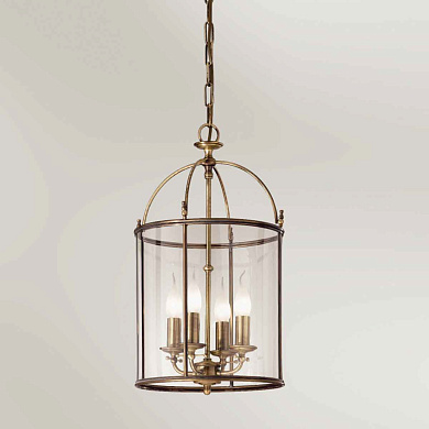 подвесной светильник в металлическом каркасе цилиндрической формы с лампами внутри