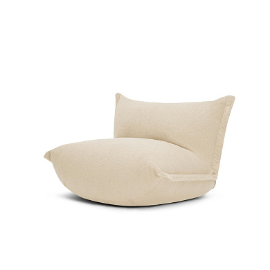 мягкое кресло бежевого цвета