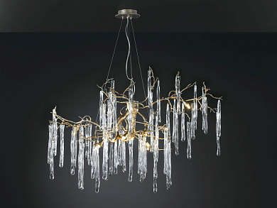 подвесная люстра с изогнутыми бронзовыми ветвями и множеством стеклянных подвесов