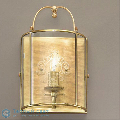 настенный светильник с овальным стеклянным плафоном в латунной раме