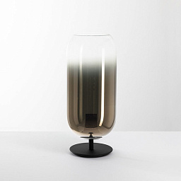 1408360A Artemide Gople настольная лампа с овальным плафоном из стекла с плавным градиентом серо-прозрачного оттенка